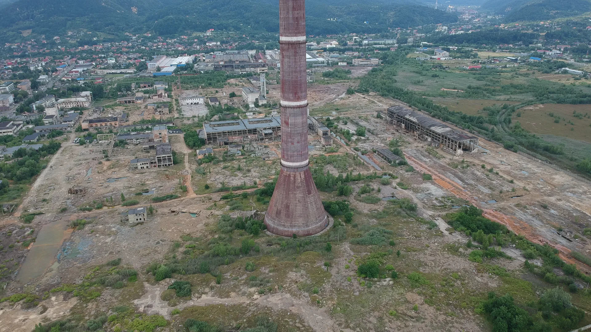 High aerial view over the chimney, the platform and Baia Mare beyond